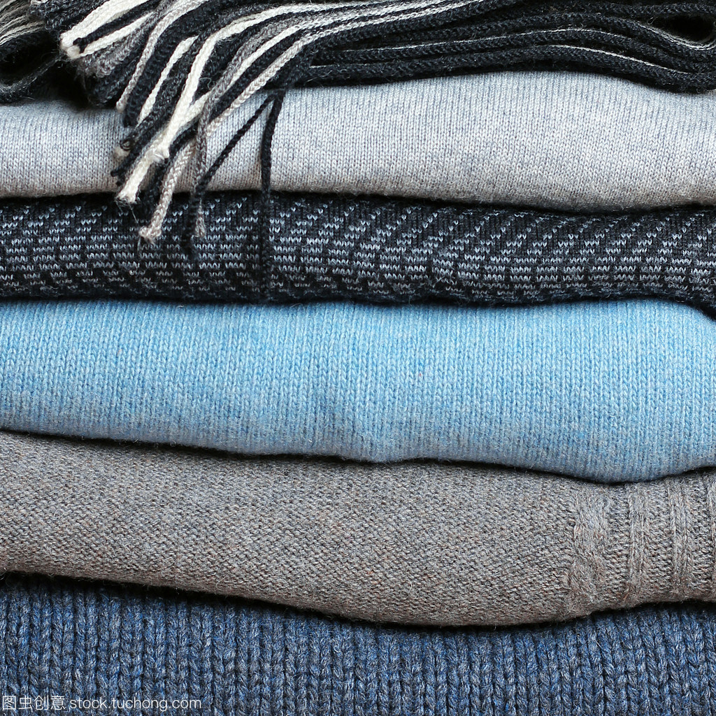 背景與溫暖的毛織服裝堆棧